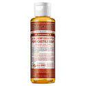 A brown labeled bottle of Dr. Bronners liquid castile soap stands upright, featuring white text detailing its organic and fair trade ingredients. The setting suggests personal care or cleaning purposes [4 oz]